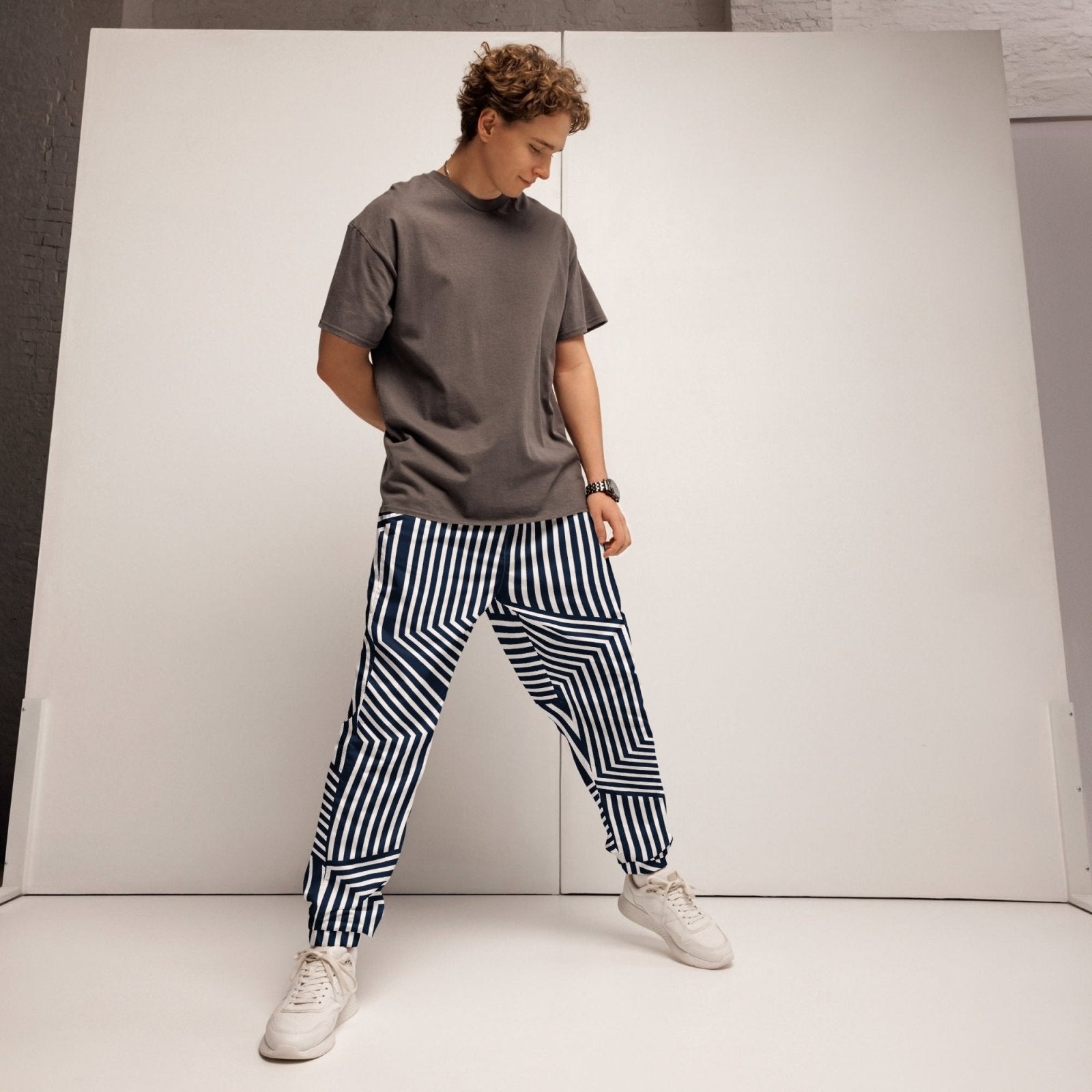 Navy Rhythm track pants - Get Zipped